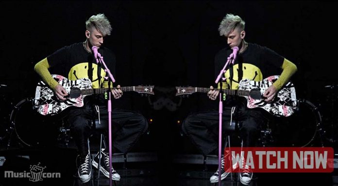 Machine Gun Kelly falls off stage at SNL