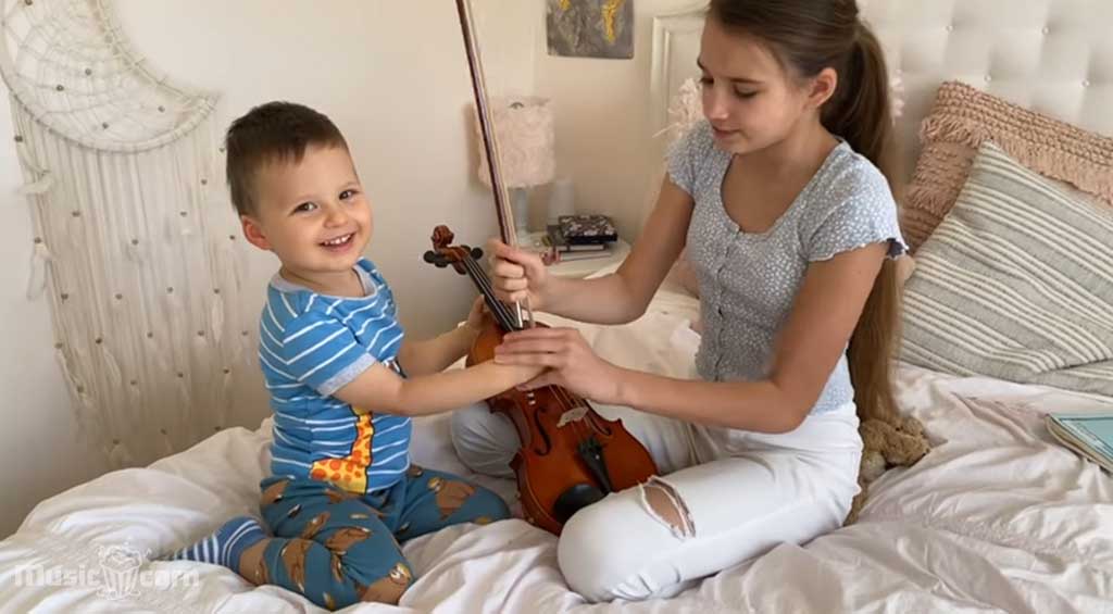 Karolina Teaches Basic Of Violin Her Little Brother