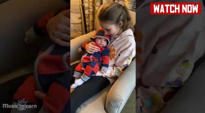 Karolina in love with Her Newborn baby brother