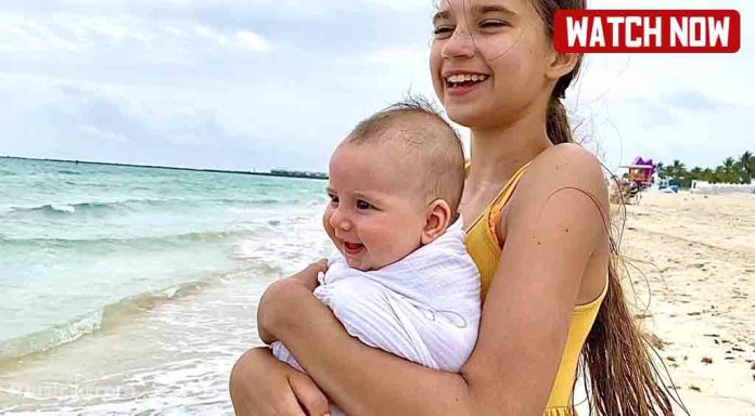 Karolina with newborn baby brother's reaction to the ocean Karolina with newborn baby brother's reaction to the ocean