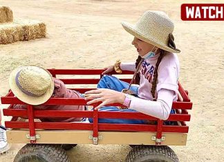 Dad is racing a farm wagon with Karolina Protsenko and Leo Dad is racing a farm wagon with Karolina Protsenko and Leo