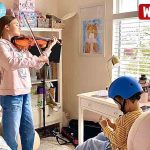 Karolina Protsenko practicing her Violin Karolina Protsenko practicing her Violin