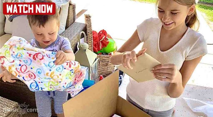 Karolina unboxing presents from her fans