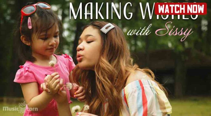 Making Wishes with sissy - Angelica and her sister Abby