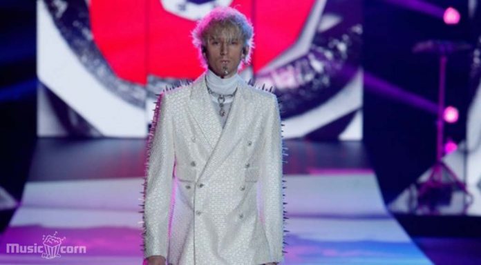 Machine Gun Kelly wears a white DolceGabbana suit