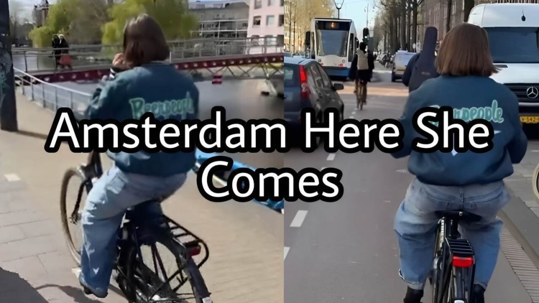 Cycling in Amsterdam - Allie Sherlock on her way to perform